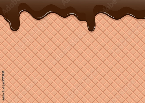 Milk chocolate flowing down on the waffle background.