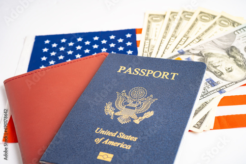 US passport issued to citizen and national of the United States of America to travel in most countries outside with USA flag and dollar money.