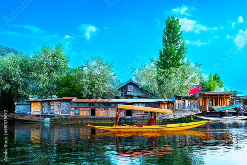 Dal Lake and the beautiful mountain range in the background, in the summer Boat Trip, of city Srinagar Kashmir India.