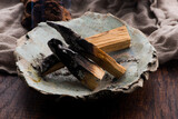 Smudging ceremony using Peruvian Palo Santo holy wood incense stick