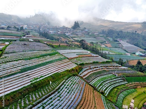 The beauty of the landscape and architecture of the arrangement of terraced houses in the tourist area of ​​Nepal van Java, Butuh Hamlet, Temanggung Village, Kaliangkrik District, Magelang, Central Ja photo