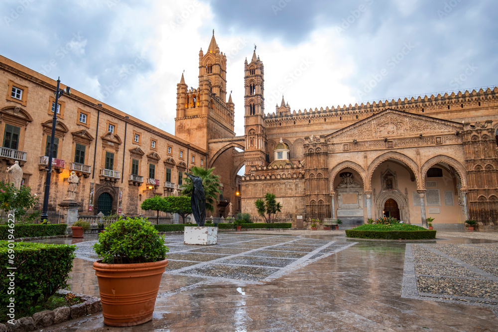Garden and entry of famous Palermo Cathedral in Palermo, Italy