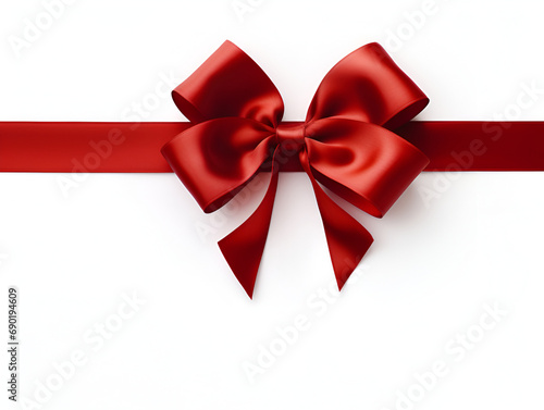 red ribbon and bow against white background with copy space for text and design.