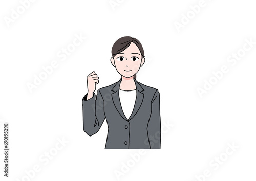 ガッツポーズするスーツの女性
