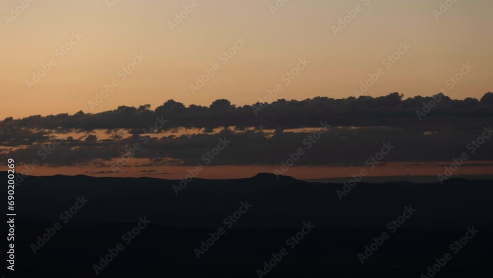 Dawn Band of Clouds Moving across Desert Landscape Before Sunrise Timelapse Dawn Band of Clouds Moving across Desert Landscape Before Sunrise Timelapse