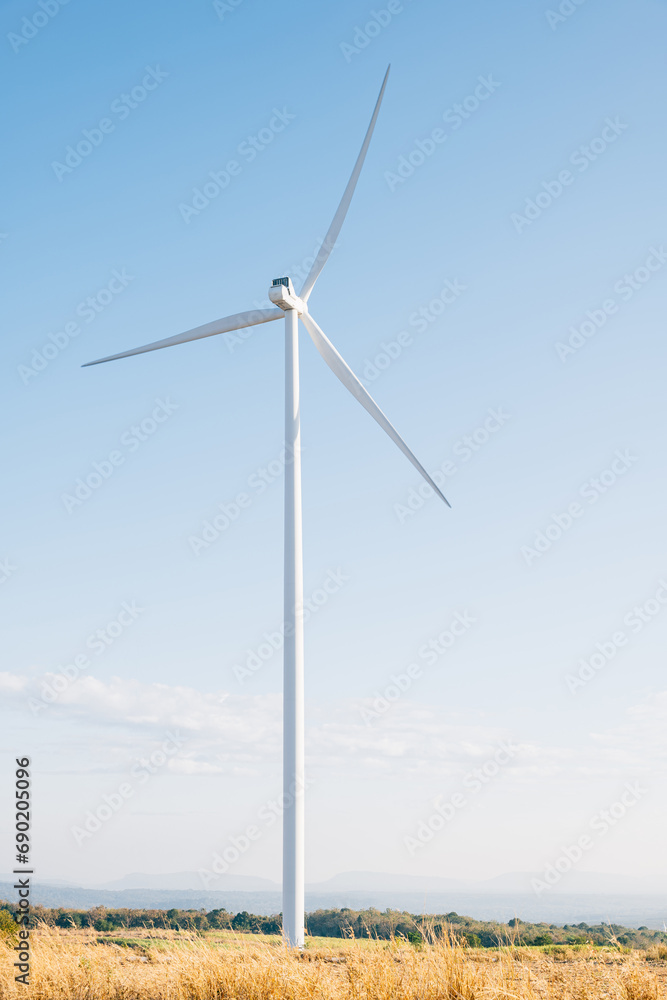 A winter windmill farm on a mountain harnesses clean wind energy with efficient turbines. Innovative technology drives sustainable development under the vast blue sky. A winter windmill farm on a mountain harnesses clean wind energy with efficient turbines. Innovative technology drives sustainable development under the vast blue sky.