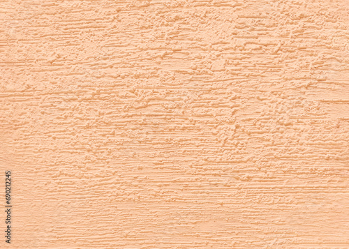 Wall texture with decorative peach plaster