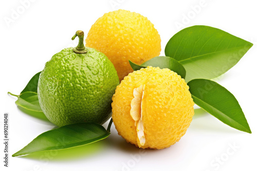 Ugli fruit with green leaves on white background