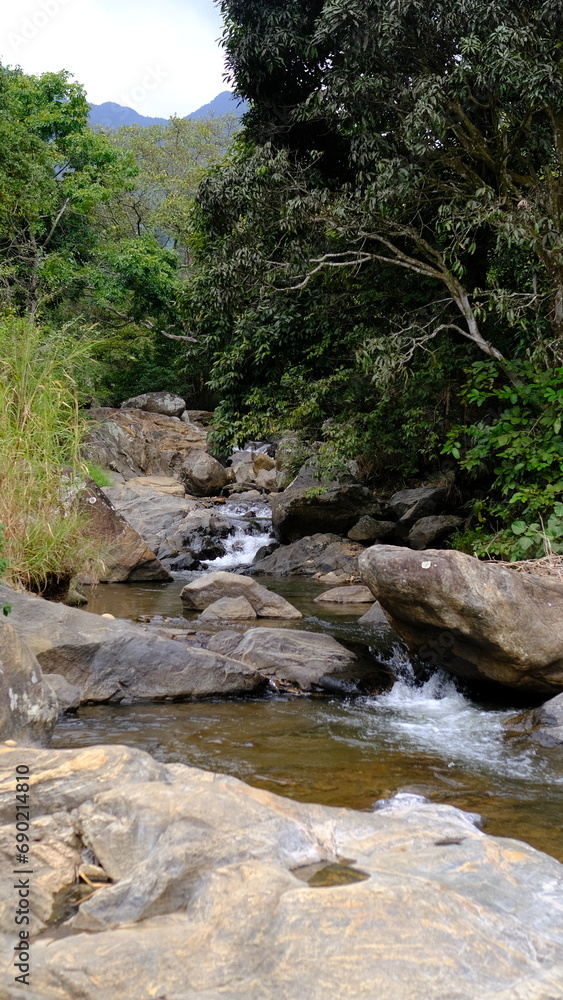 Waterfall and rocks landscape view Waterfall and rocks landscape view