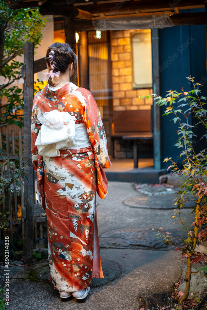 Japanese Kimono Portrait back view photography. Kyoto, Japan. Japanese traditional buildings background. Japanese Kimono Portrait back view photography. Kyoto, Japan. Japanese traditional buildings background.