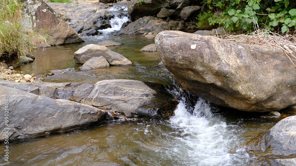 Waterfall and rocks landscape view Waterfall and rocks landscape view