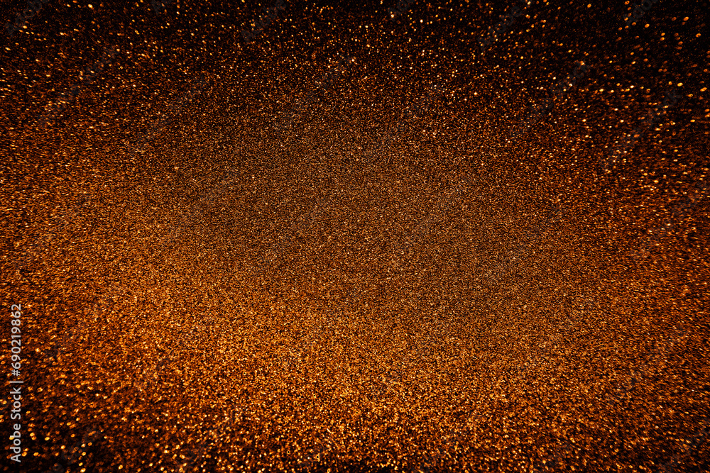 gold black glitter texture abstract banner background with space. Twinkling glow stars effect. Like outer space, night sky, universe. Rusty, rough surface, grain.