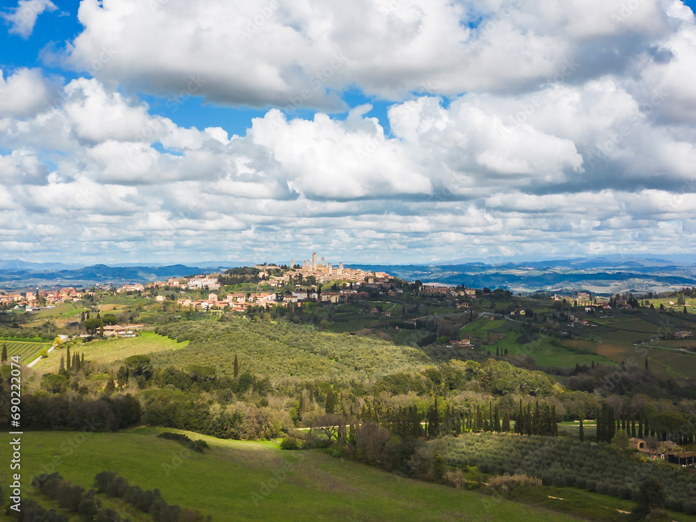 Aerial view of tuscany landscape with San Gimignano in the background. Siena, Tuscany, Italy.