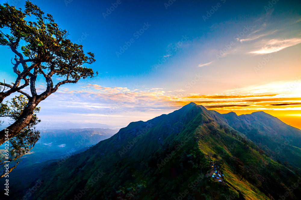 Fototapeta premium Thai National Park Sunset on the mountains Tat Mok National Park travel, hiking, camping in Thailand.