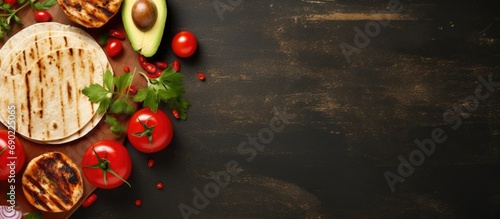 Healthy corn tortillas with grilled chicken avocado fresh tomatoes limes place for text top view. Website header. Creative Banner. Copyspace image
