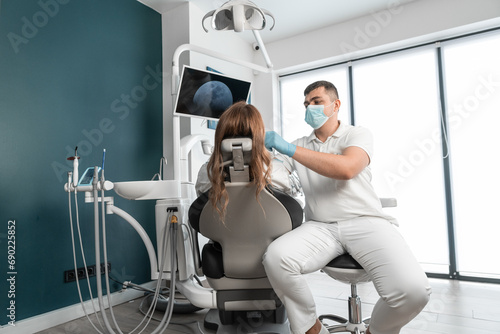 The dentist carefully analyzes the condition of the patient's teeth and oral cavity. The medical center provides modern and safe dental treatment for its patients. The dental clinic helps patients