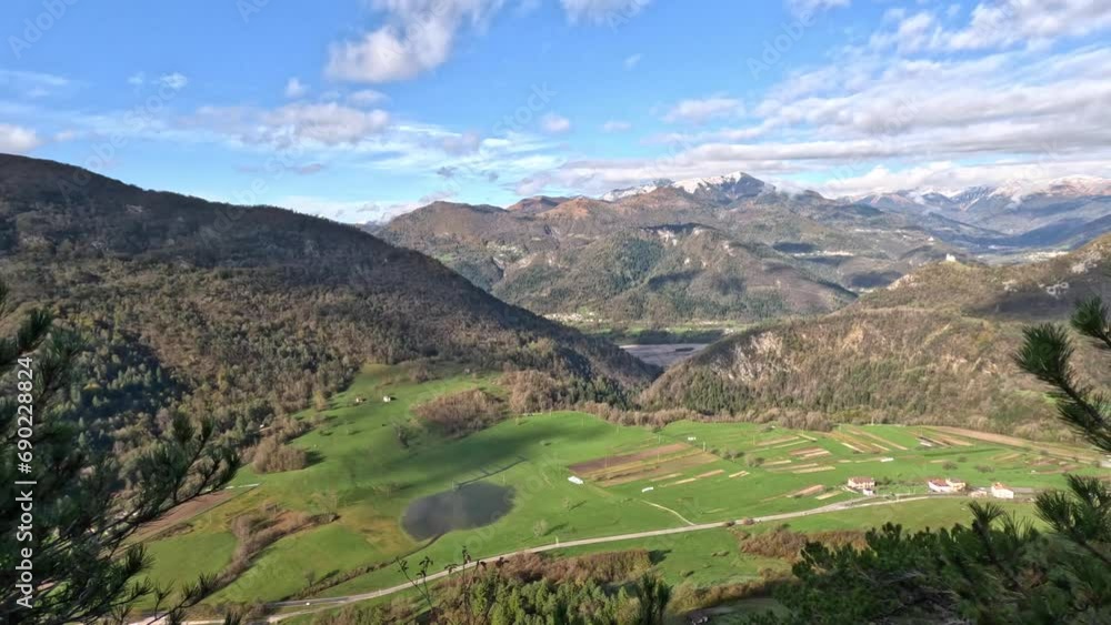 Video Panorama of a mountain village seen from above. Shot of the road that leads to the town, of trees and the peace that can be felt in the woods. Sunny day with no people around. Video Panorama of a mountain village seen from above. Shot of the road that leads to the town, of trees and the peace that can be felt in the woods. Sunny day with no people around.