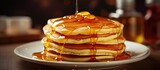 Fluffy buttermilk pancakes with butter and maple syrup. Website header. Creative Banner. Copyspace image