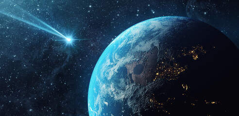 Comet, asteroid, meteorite flying to the planet Earth.  Glowing asteroid and tail of a falling comet threatening the safety of the Earth.  Elements of this image furnished by NASA.