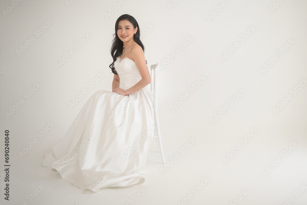 Portrait of beautiful bride with makeup and hairstyle in elegant wedding dress, wedding ceremony Portrait of beautiful bride with makeup and hairstyle in elegant wedding dress, wedding ceremony