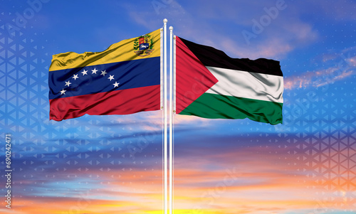 Venezuela and palestine two flags on flagpoles and blue cloudy sky . Diplomacy concept, international relations