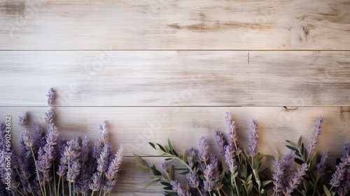 light wood background with some eucalyptus and lavender branches  copy space  16 9