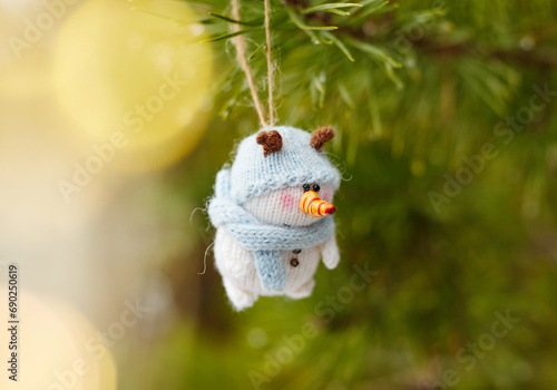 toy snowman with christmas tree © Александр Плисик