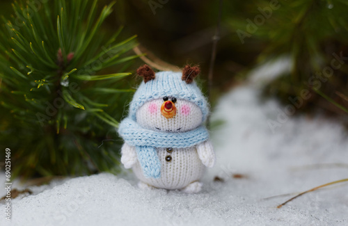 toy snowman with christmas tree © Александр Плисик