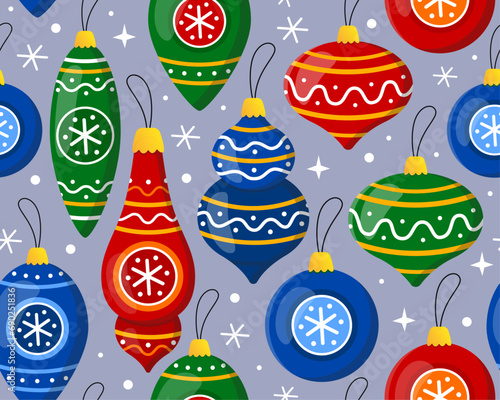 Seamless pattern with colorful Christmas balls on a gray background. New year's toys, decor for christmas tree, snowflakes. Pattern for New Year's wrapping paper, cards, decor, fabric.