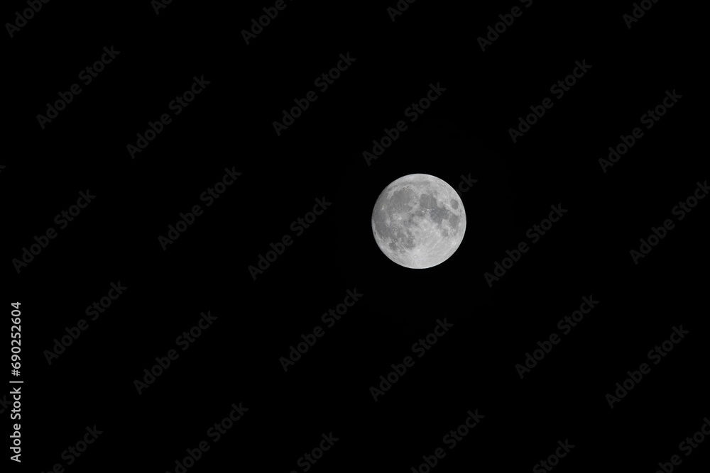 Super full moon with dark background. Madrid, Spain, Europe. Horizontal Photography. Super full moon with dark background. Madrid, Spain, Europe. Horizontal Photography.