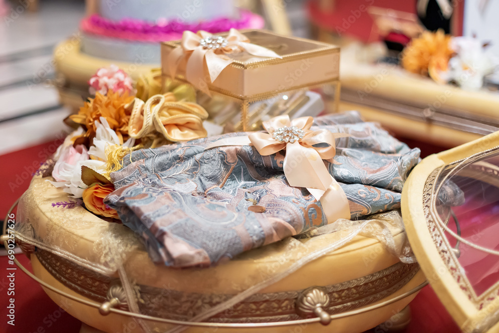 Moroccan wedding gifts. A gift given by the groom to his wife as an expression of his love for her. Jewelry, traditional clothes and shoes Moroccan wedding gifts. A gift given by the groom to his wife as an expression of his love for her. Jewelry, traditional clothes and shoes