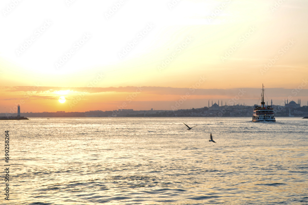 Old town, seagulls and sunset from Kadikoy Old town, seagulls and sunset from Kadikoy