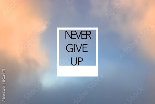 Never give up motivational quote inside frame.  photo