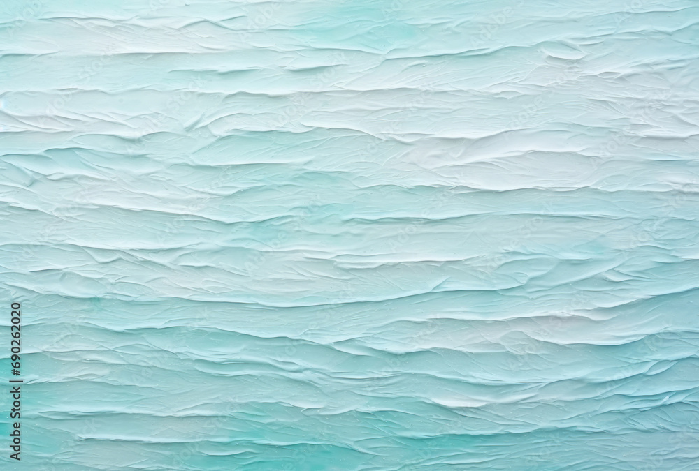 Obraz premium Textured waves in varying shades of aqua and light blue create a serene, oceanic backdrop with a soothing, rhythmic pattern.