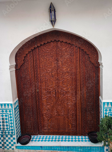 An old traditional Moroccan door in the ancient city of Tangier Morocco photo