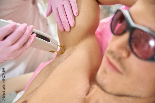 Beauty salon client at a laser hair removal session