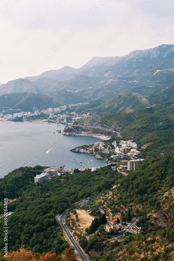 View from the mountain of the rugged coast of the Bay of Kotor with resort towns. Montenegro
