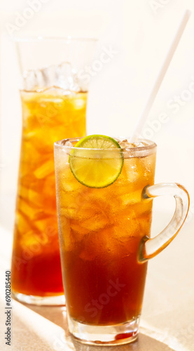 two glasses of lemon ice tea on the table