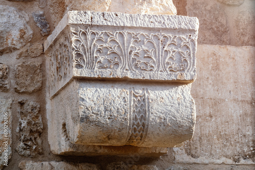 Patterned marble Modillion ornate bracket, antique byzantian architectural detail, Antalya old town photo