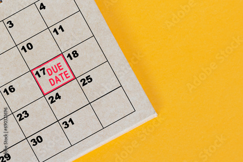 Red mark on the calendar at 17 for reminder of due date.