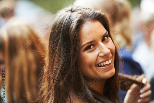 Happy, outdoor festival portrait and woman having fun, happiness and smile at Portugal social gathering. Music concert freedom, face headshot and Europe vacation person, entertainment or rave event