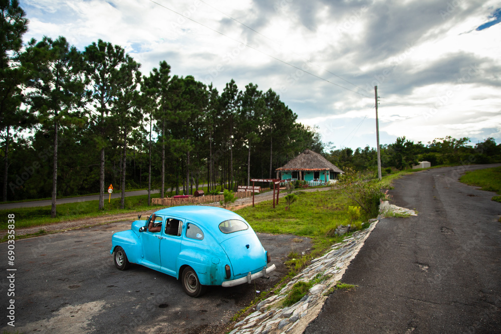 car near the highway in Cuba