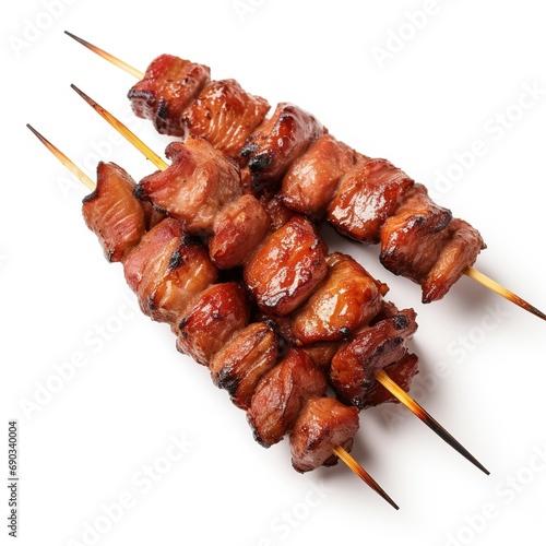 Grilled pork meat on a stick isolated on white background