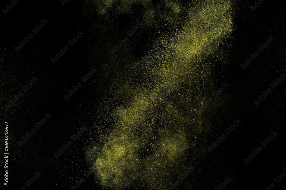 Yellow explosion on black background. Light gold dust texture.