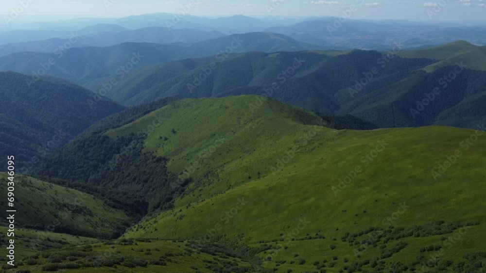 Aerial photography of mountain valleys in the Carpathian Mountains. Drone view from Mount Styi in the Ukrainian Carpathians. Aerial photography of mountain valleys in the Carpathian Mountains. Drone view from Mount Styi in the Ukrainian Carpathians.