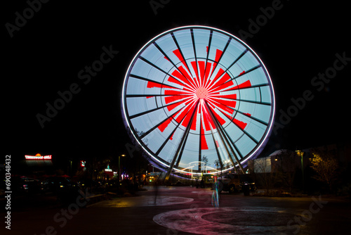 Glowing Ferris Wheel in Night Sky at Timberwood Grill, Tennessee photo