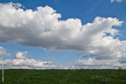 Springtime Cloudscape over Lush Green Field in Rural Indiana