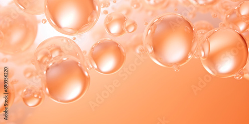 A bunch of bubbles floating on top of each other. Monochrome peach fuzz background.