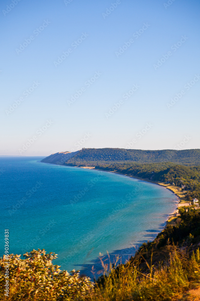 Daylight View of Turquoise Sea and Lush Headland at Empire, Michigan