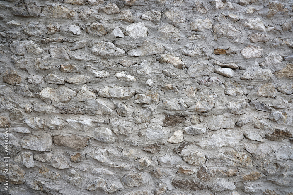 Very old brick stone wall of castle or fortress of 18th century. Full frame wall with obsolete dirty and cracked bricks close up Very old brick stone wall of castle or fortress of 18th century. Full frame wall with obsolete dirty and cracked bricks close up